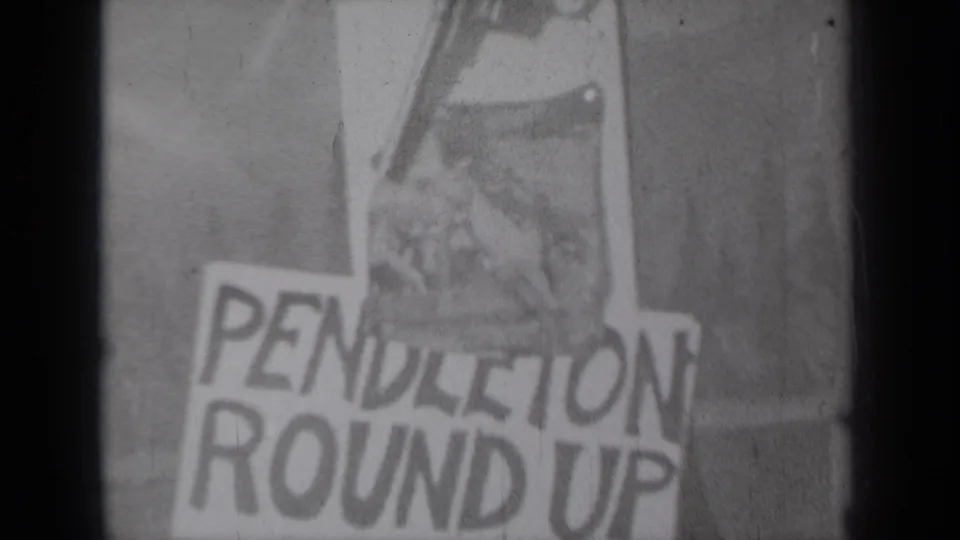 1937 Klamath, California frame with Pendleton Round Up signage and a close, soft-focus view of revolver hardware above.