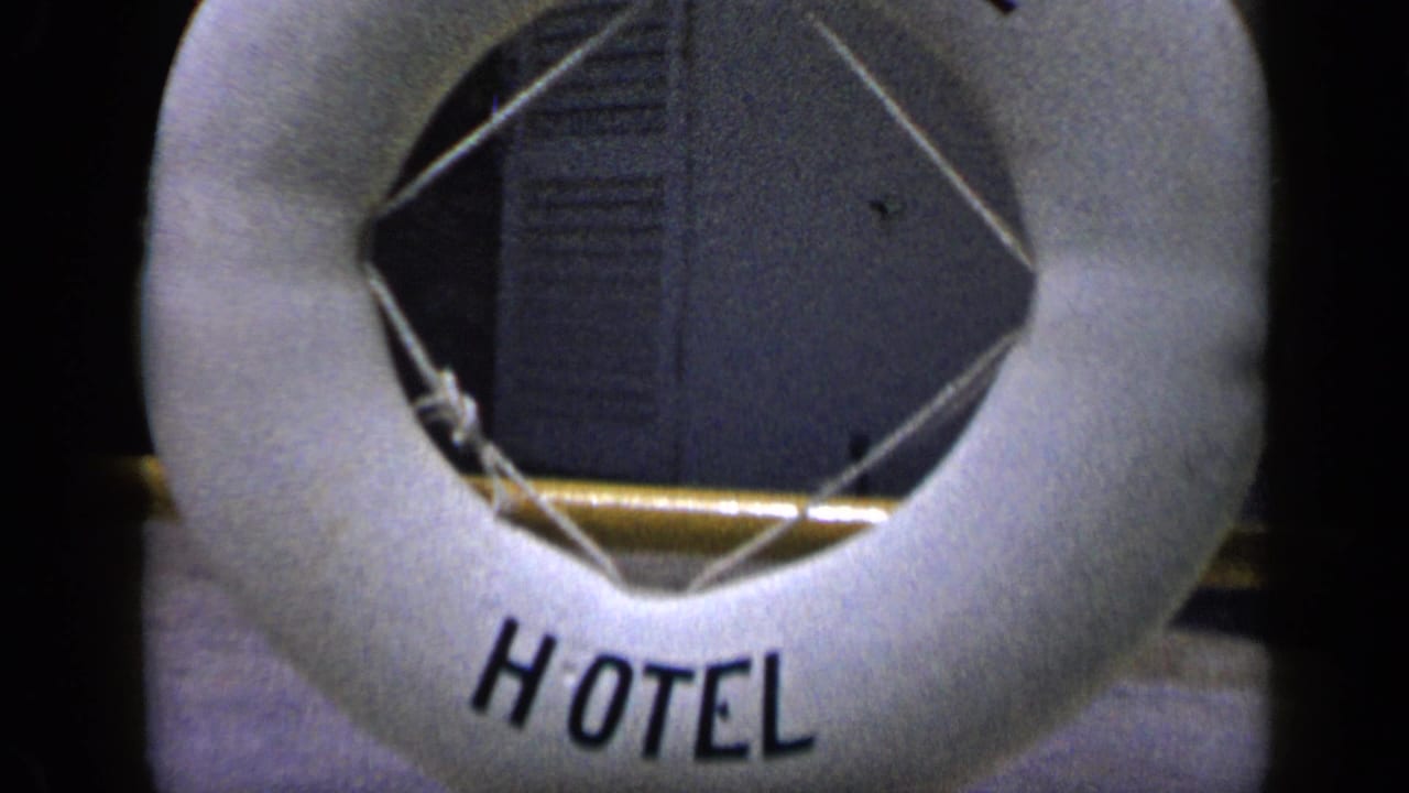 1959 Venezuela frame showing more of the round buoy, including HOTEL lettering at the bottom.