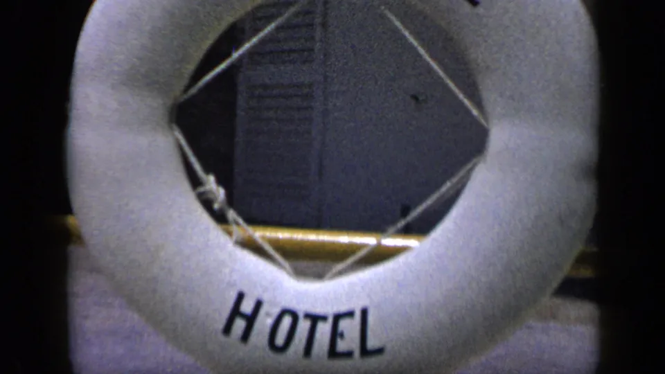 1959 Venezuela frame showing more of the round buoy, including HOTEL lettering at the bottom.