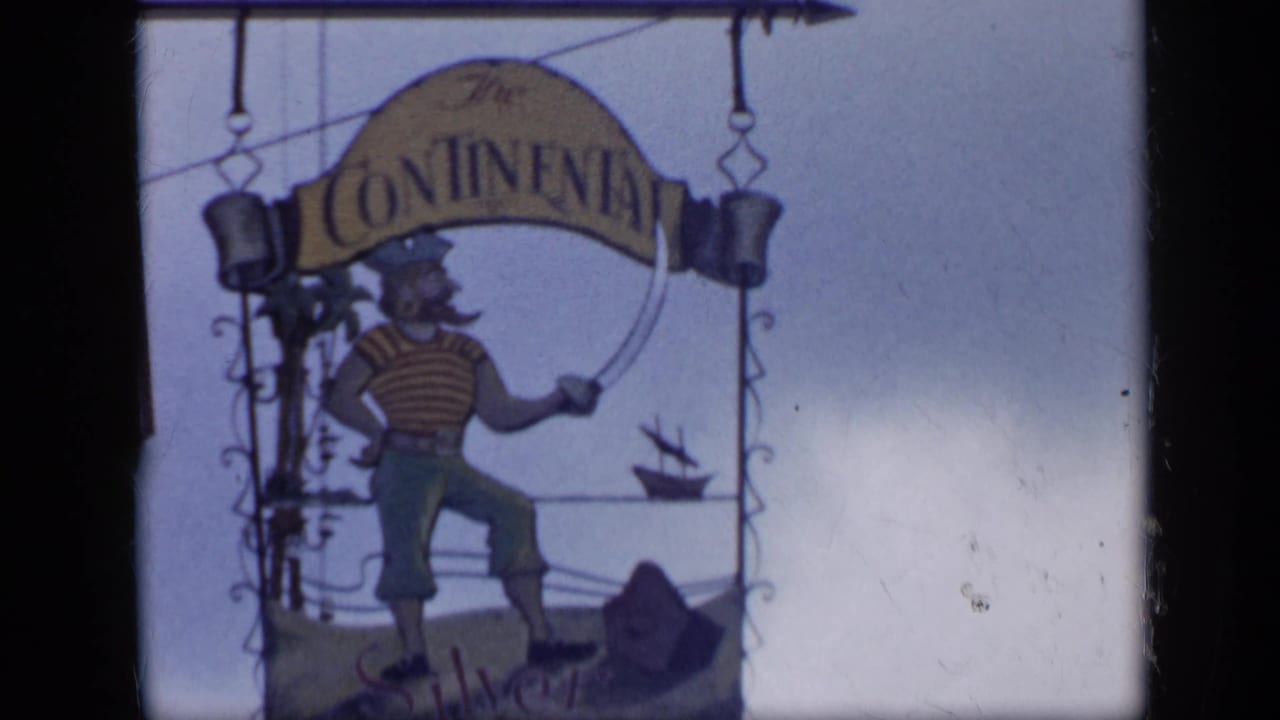 Hanging Continental sign in Venezuela, illustrated with a nautical pirate or sailor figure and a small ship motif.