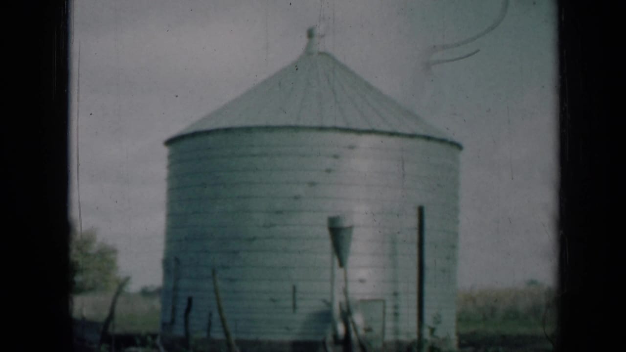 The clip ends on a white farm silo and fence posts in a rural Missouri landscape.