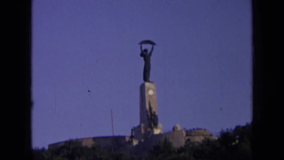 Visitor-shot 1963 Russia footage shows the monument from below, softened by film grain and slight focus loss.