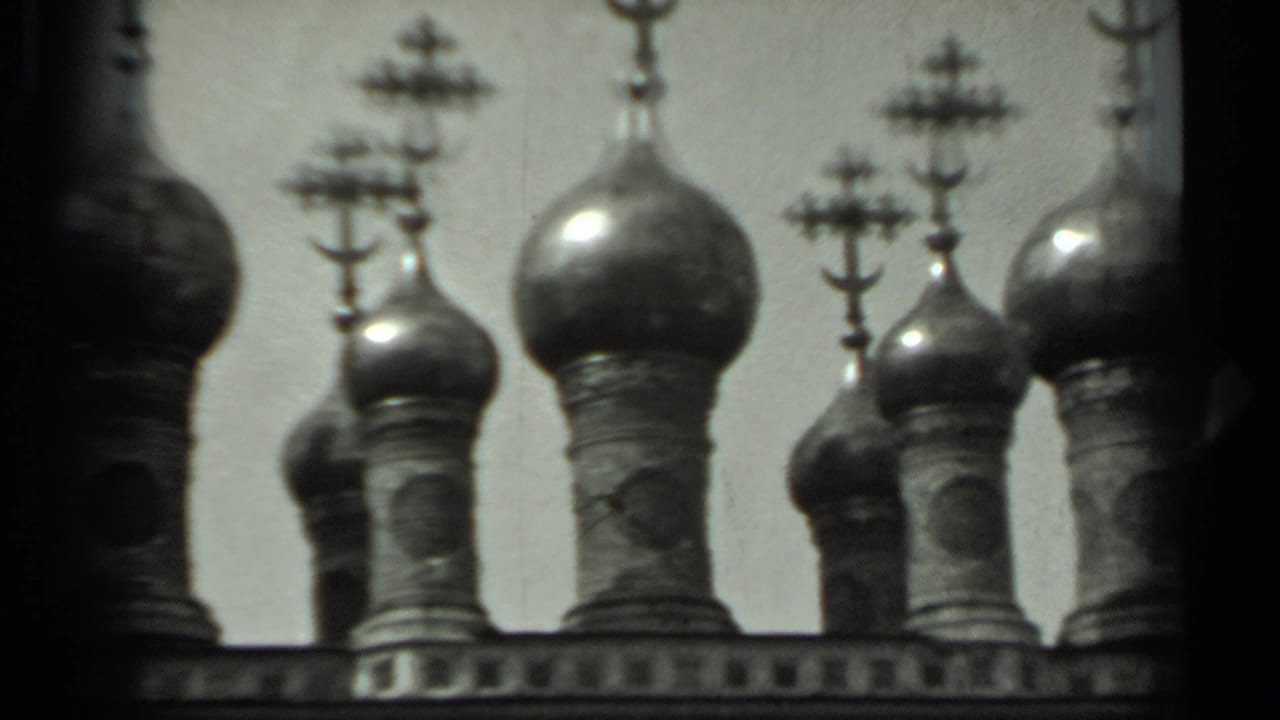 Russian Orthodox cathedral domes and crosses appear in soft monochrome 8mm footage from the supported 1963 Russia metadata.