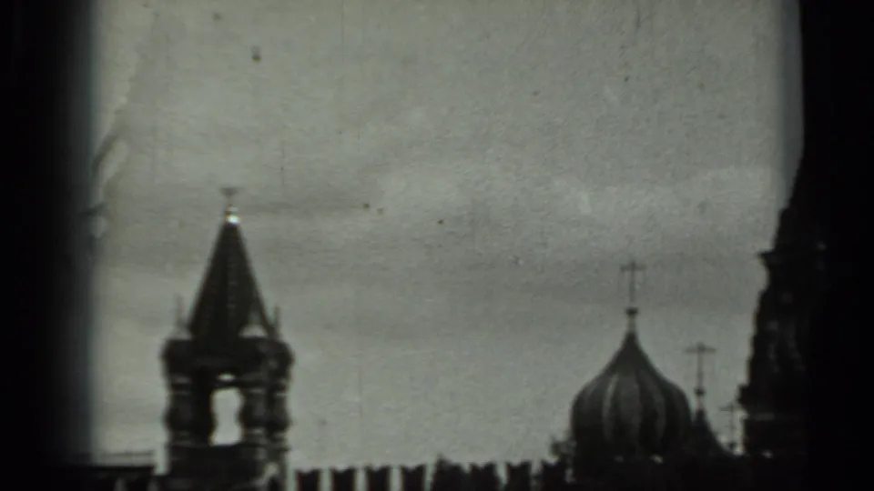 End of the 1963 Russia pan with a small tower, onion dome, crosses, crenellated wall, and dark 8mm frame edge.