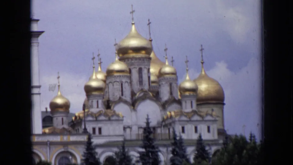 1971 Moscow 8mm close view of gilded Orthodox domes and crosses, likely within the Kremlin area, framed from below.