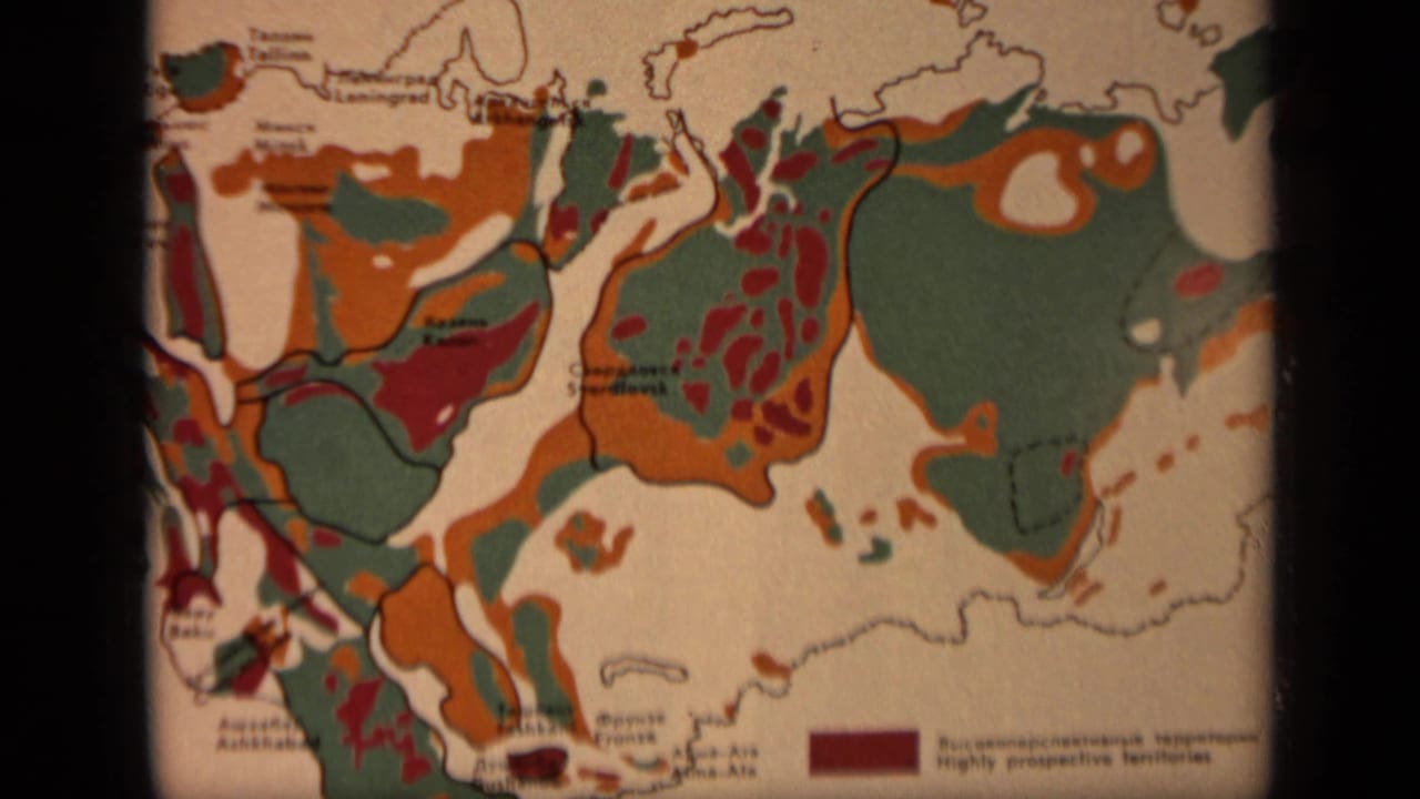 Closer view of the same printed Russia map with colored zones and labels.