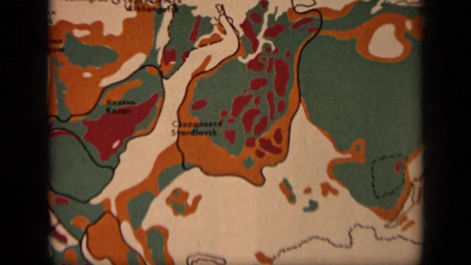 1971 8mm close-up of a Russia map section around Kazan and Sverdlovsk, with red clusters, green fields, and orange areas.