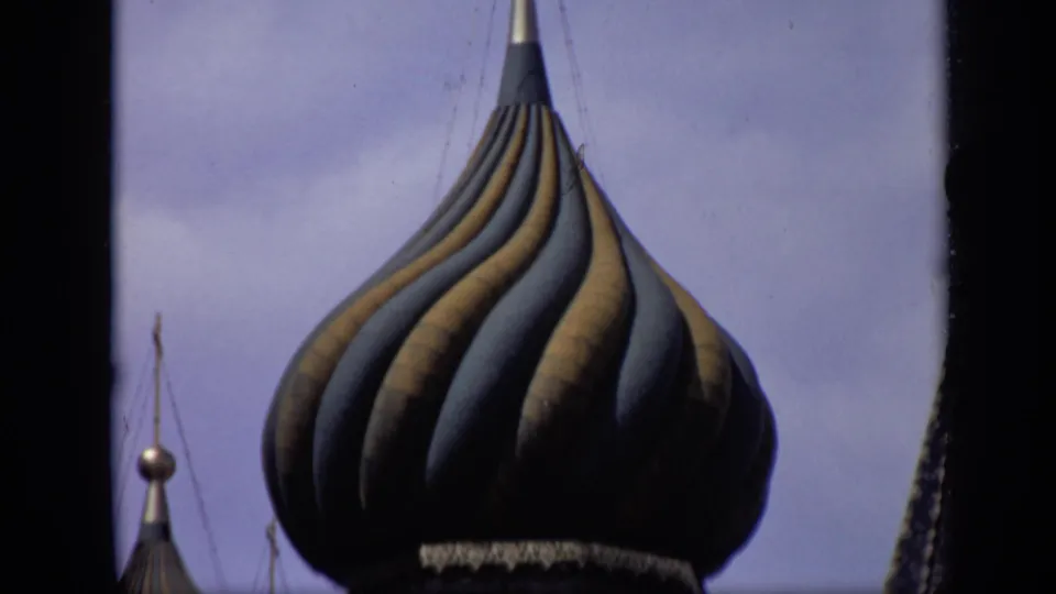 Close 1971 Moscow 8mm view of a ribbed St. Basil's Cathedral onion dome with smaller spires at the edges.
