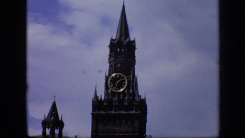 1971 Moscow 8mm frame with Spasskaya Tower filling much of the view, including the clock, spire, and nearby roofline details.