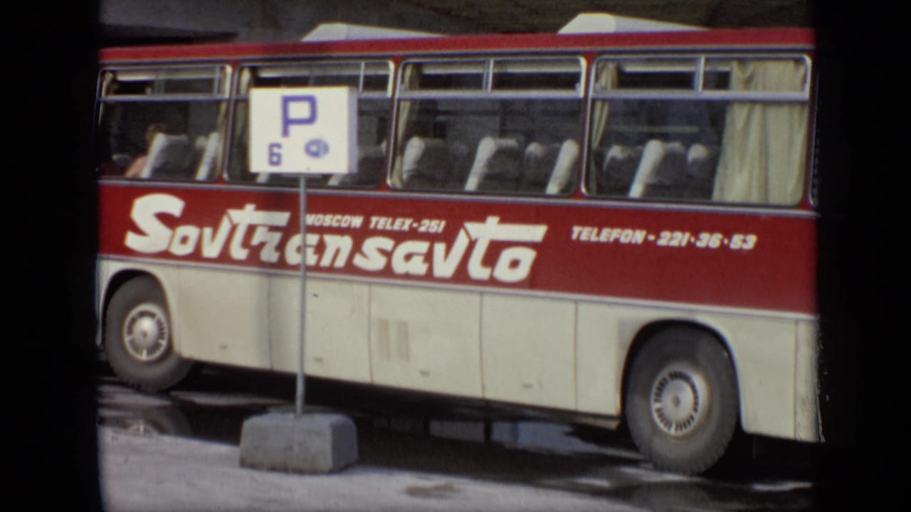 1971 Moscow view of the Sovtransavto coach side, showing the company name, Moscow Telex text, passengers, and a P 6 sign.