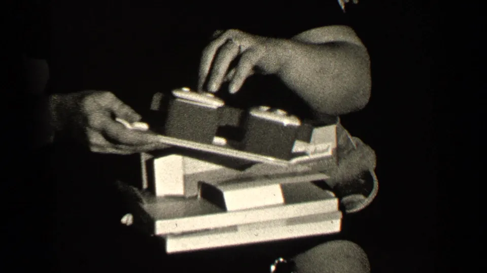 In the bridal shower footage, several hands handle wrapped boxes and paper near a seated woman in a dark dress.