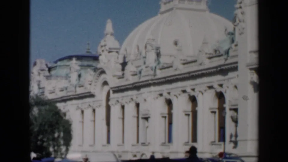 1960 Venice home-movie view of the domed architectural landmark, showing pale stonework, windows, trees, and handheld framing.