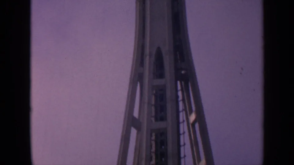 1963 8mm frame showing the tower shaft and angled supports during an upward tilt in Washington.