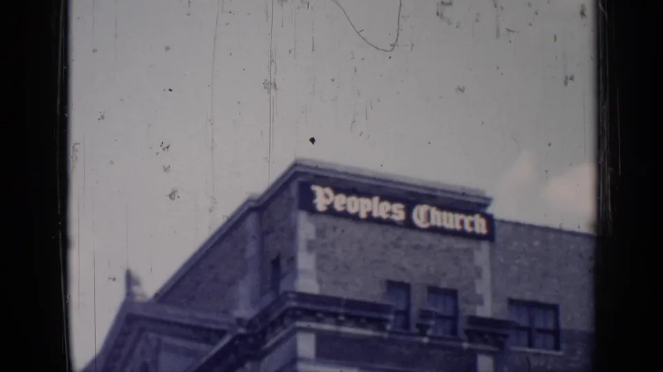1957 Chicago shot of the Peoples Church exterior, with large lettering across the upper brick facade and architectural trim below.