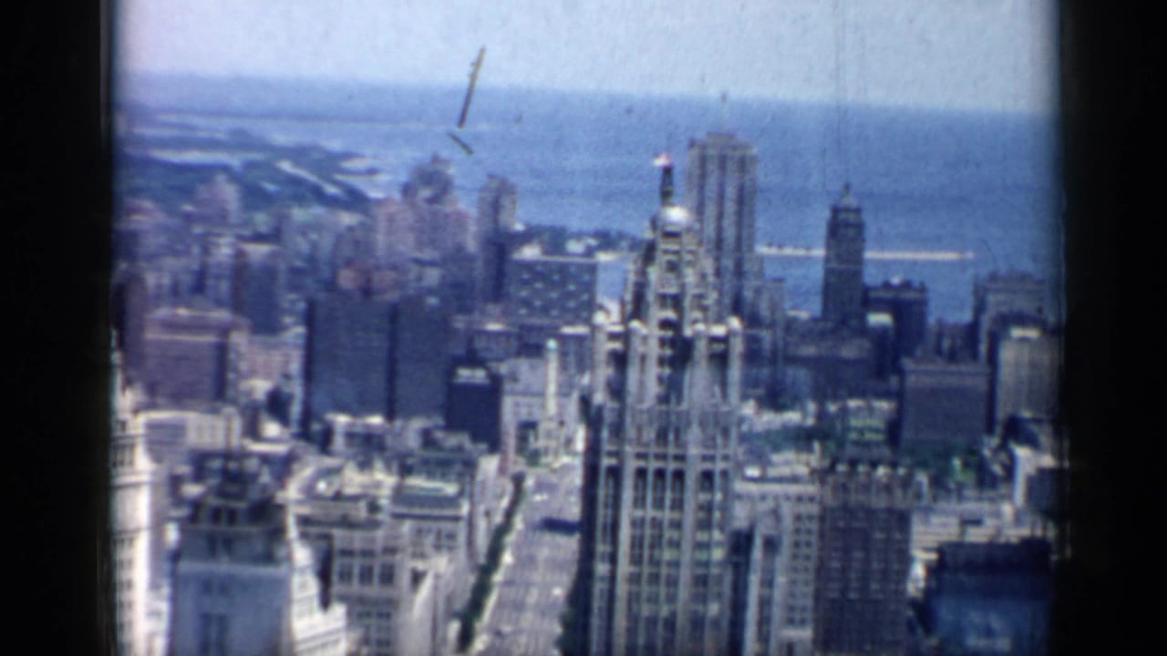 Downtown Chicago skyline seen from above with Lake Michigan beyond.