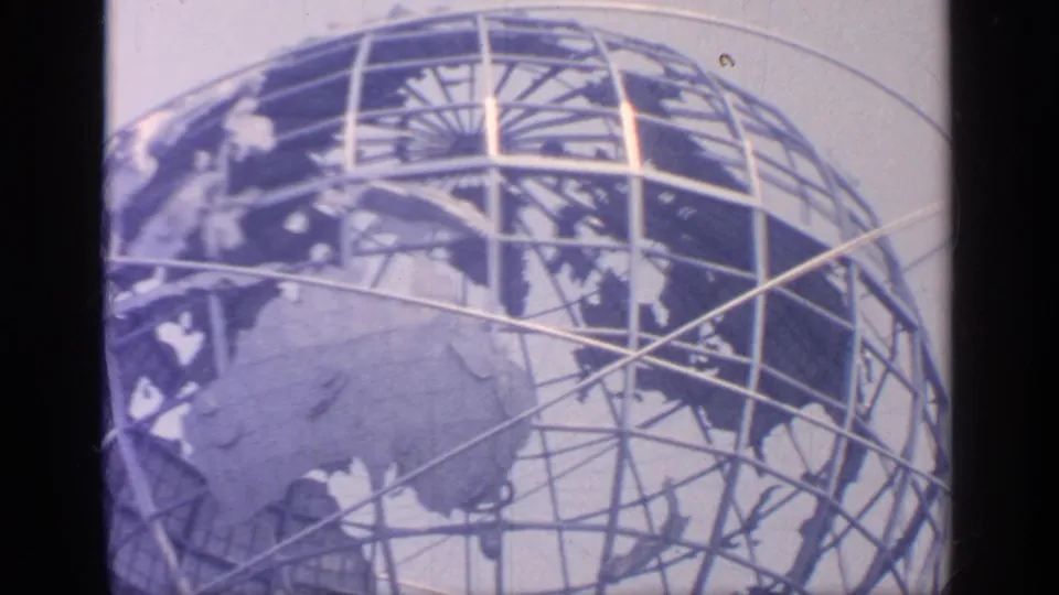 1964 Flushing Meadows close view of the Unisphere, showing continents, metal rings, and structural gridwork.