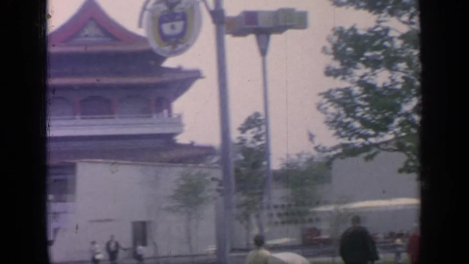 1964 Flushing Meadows fair footage appears to show visitors near a Chinese-themed pavilion entrance and signage.