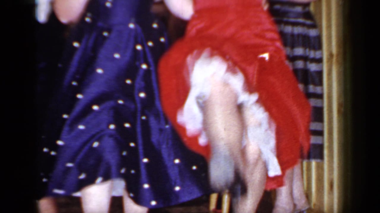 1966 Mineola frame of cancan-style movement, with a red dress, navy polka-dot dress, and white ruffled hem visible.