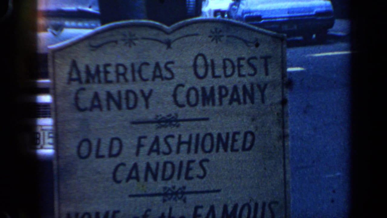 Closer view of the candy-company sign advertising old-fashioned candies and caramels.