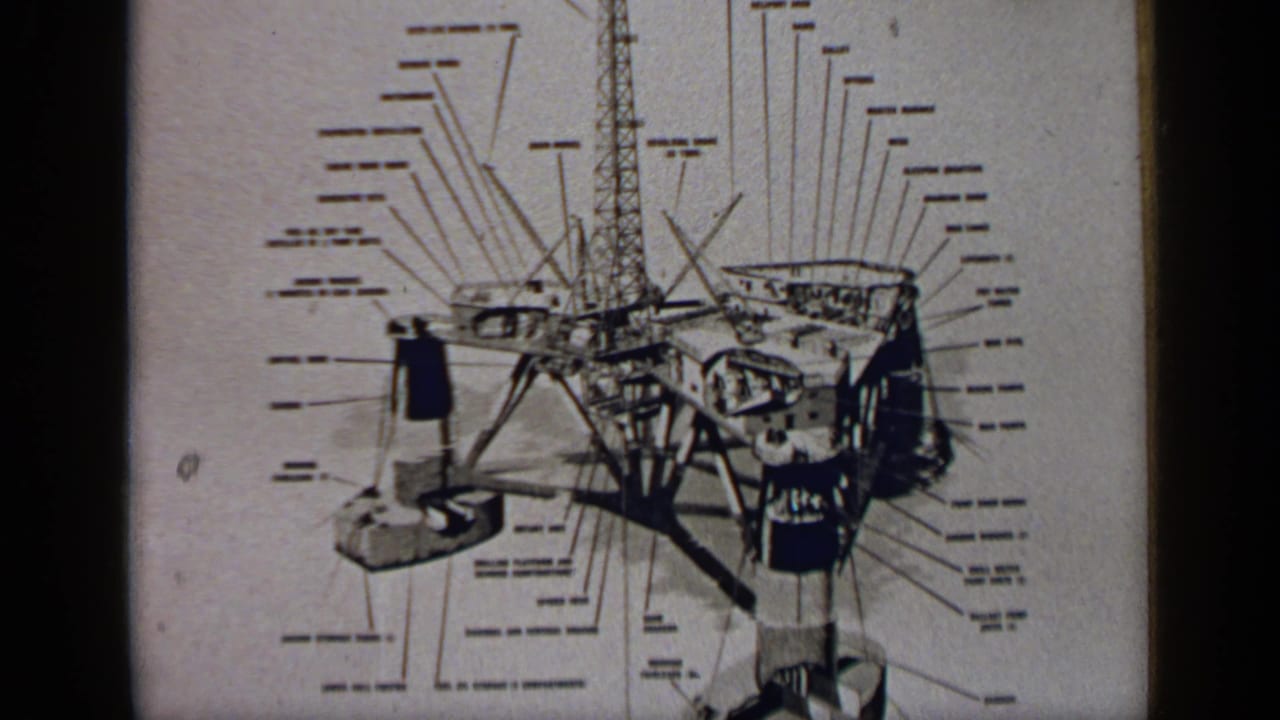 Black-and-white schematic of an offshore platform with many label lines and dark 8mm frame borders.