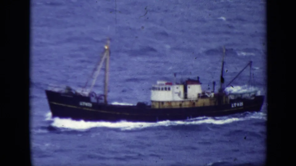 1970 United Kingdom Super 8 frame of the LT425 fishing trawler crossing rough open water near the end of the clip.