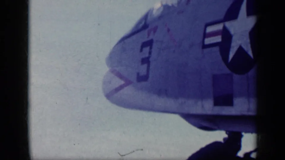 Side view of the aircraft nose in 1962 Cuba footage, with number 3 and a U.S. military star insignia visible.