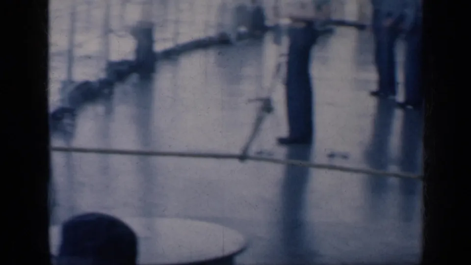 Soft 8mm view of a naval vessel deck with railings, fittings, and structural details, consistent with the supplied 1962 Cuba metadata.