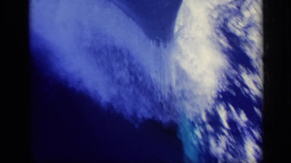 Foamy wake spreads through deep blue water in this 1962 Italy 8mm maritime shot.