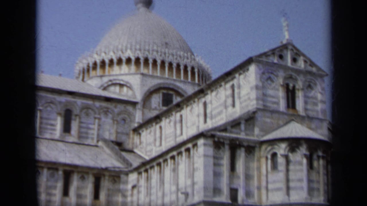 White marble cathedral exterior with dome, arched windows, and dark 8mm frame edges.