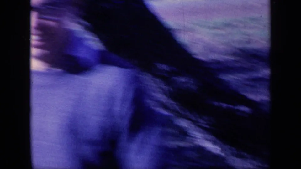 A heavily blurred handheld frame shows a person moving or the camera swinging outdoors in the same 1968 Florida home movie.