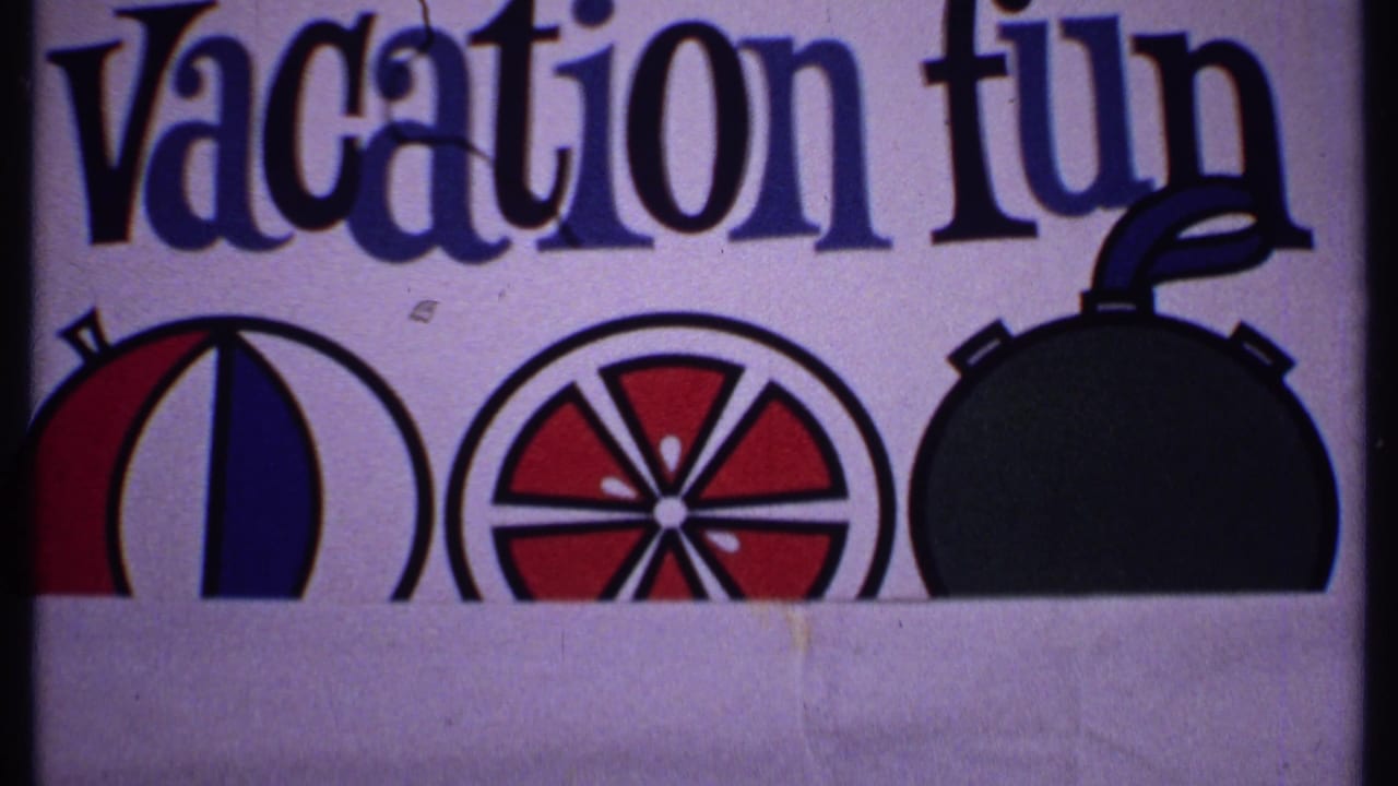 1969 Bahamas travel-related frame showing the top of a folded printed advertisement with "Vacation fun" text and colorful graphic icons.