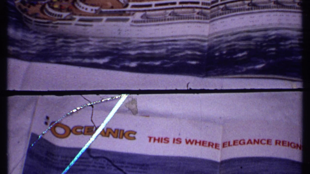 Oceanic promotional ship artwork with partial slogan text and film scratches.