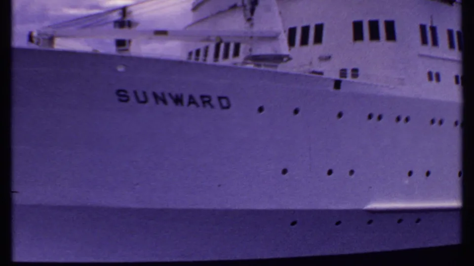 The Sunward name is visible on the white hull as the camera frames the ship side and upper deck windows.