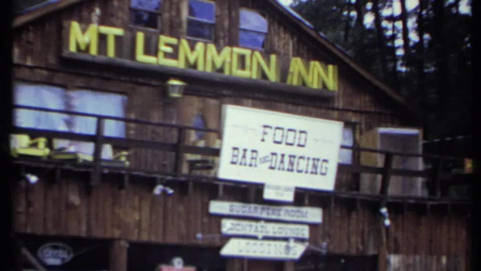 1971 California footage shows the Mt Lemmon Inn lettering, balcony windows, yellow chairs, and a white food bar and dancing sign.