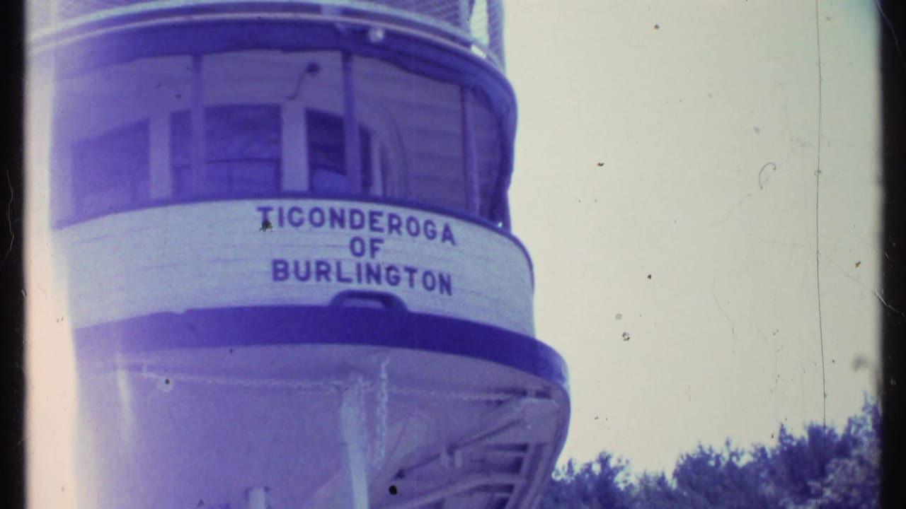 Close view of a boat bow with the name Ticonderoga of Burlington.
