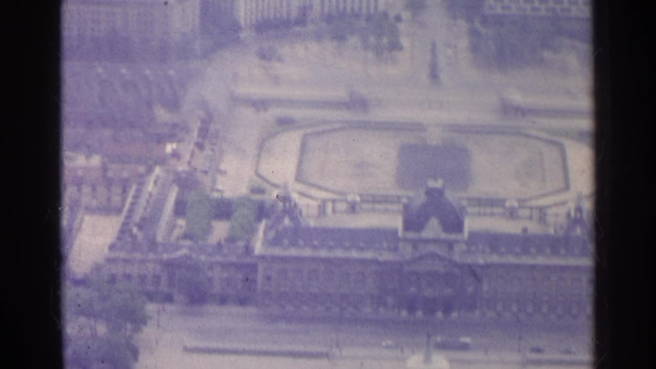 Aerial view of the same formal garden and surrounding Paris buildings.