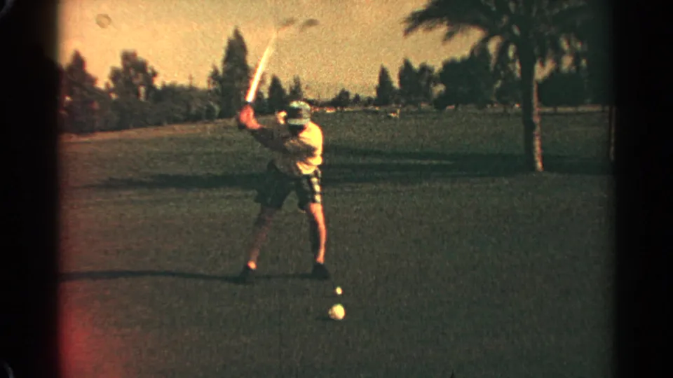 In the final 1968 Scottsdale frame, the golfer holds the club high while the ball remains visible on the fairway.