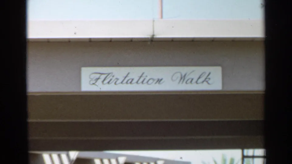 The 1968 Scottsdale shot holds on the Flirtation Walk sign, framed by dark 8mm borders and sunlit architecture.