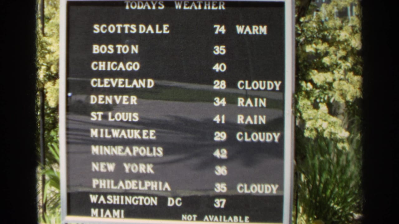 Weather board listing U.S. city temperatures, with Scottsdale shown as 74 and warm.