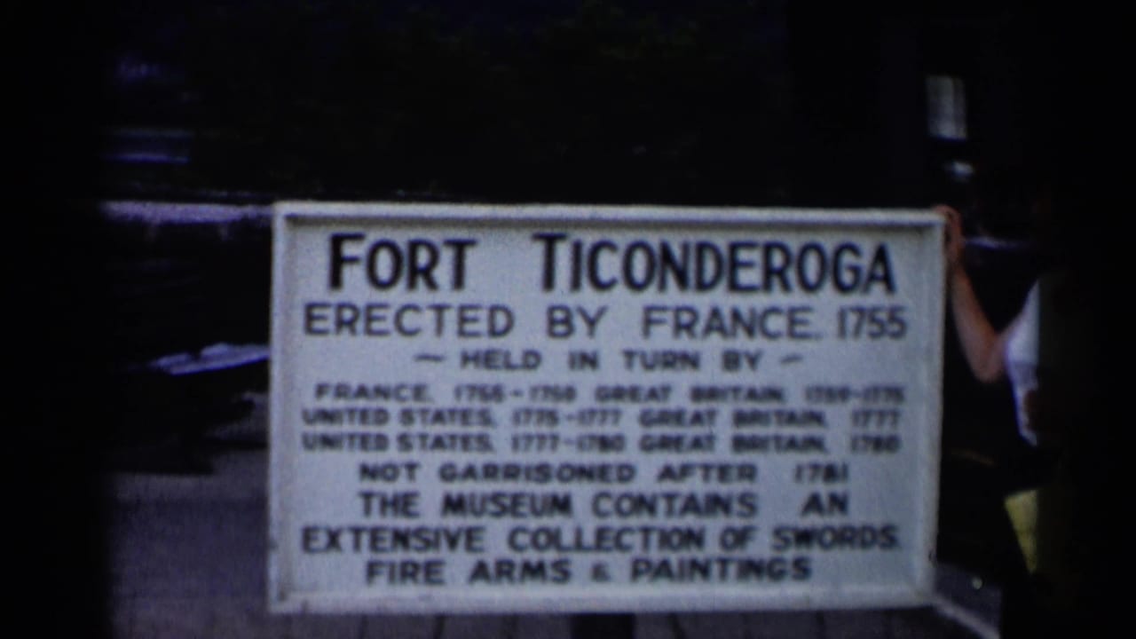 The Fort Ticonderoga sign is centered, with text about the fort and museum collections visible in the 1955 home-movie frame.