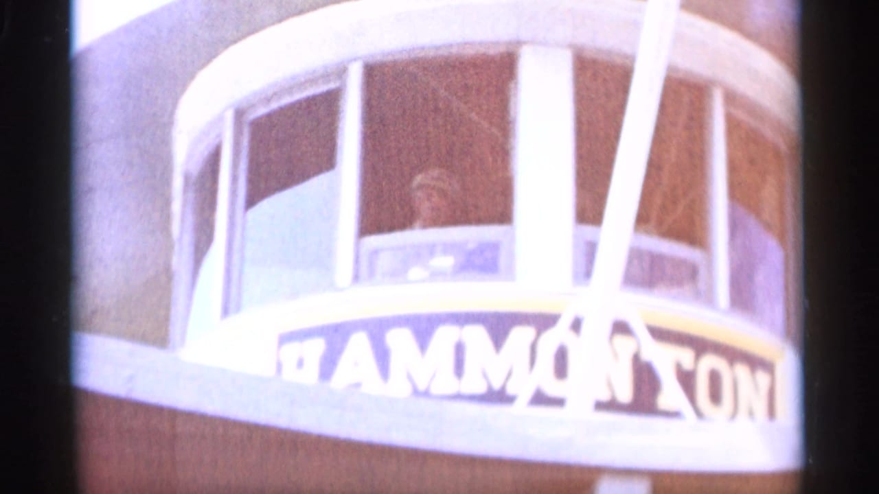 Cape Cod ferry pilothouse with partial Hammonasset lettering visible below the windows in 1956 8mm footage.