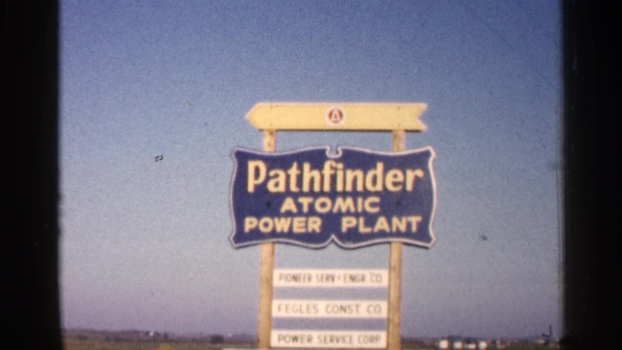 Pathfinder Atomic Power Plant sign against a blue sky.