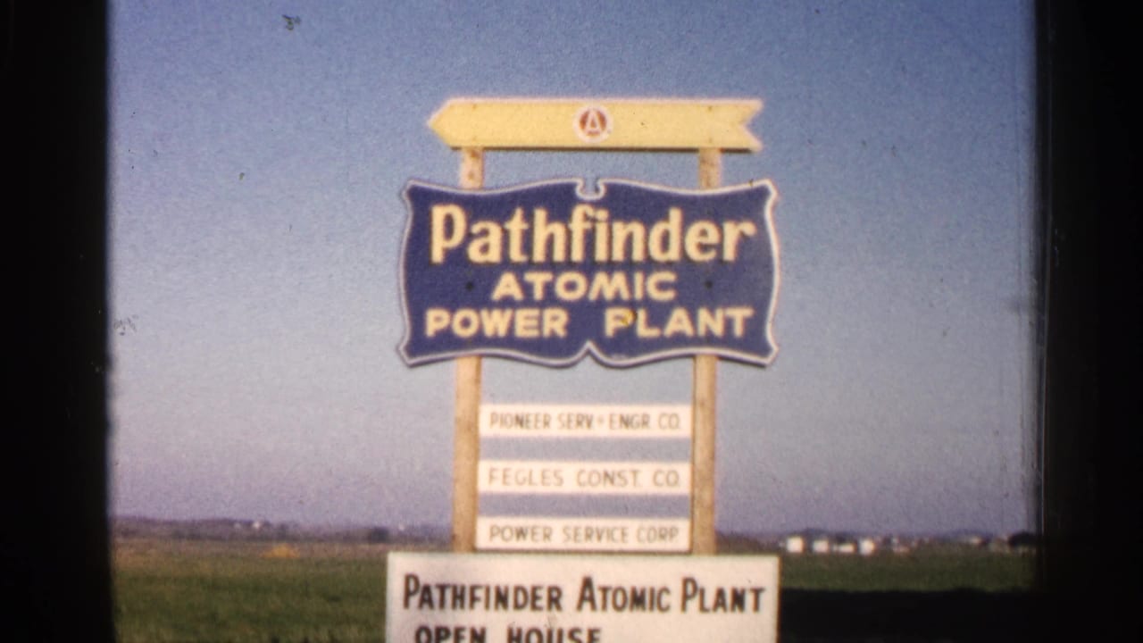 Pathfinder Atomic Power Plant sign with open-house board partly visible below.