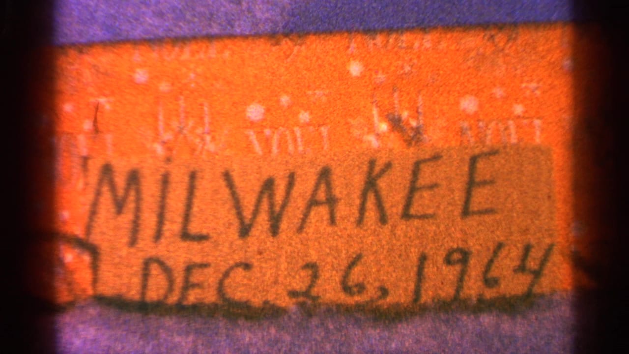 Handwritten orange film label reading Milwaukee and Dec. 26, 1964.