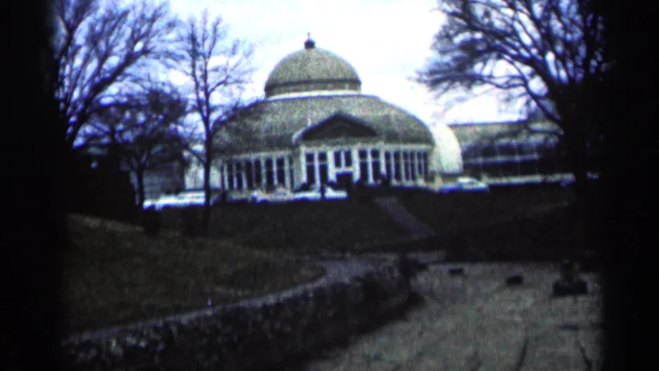 1964 Minnesota 8mm frame showing the domed exterior from a slightly closer or steadier view along the path.
