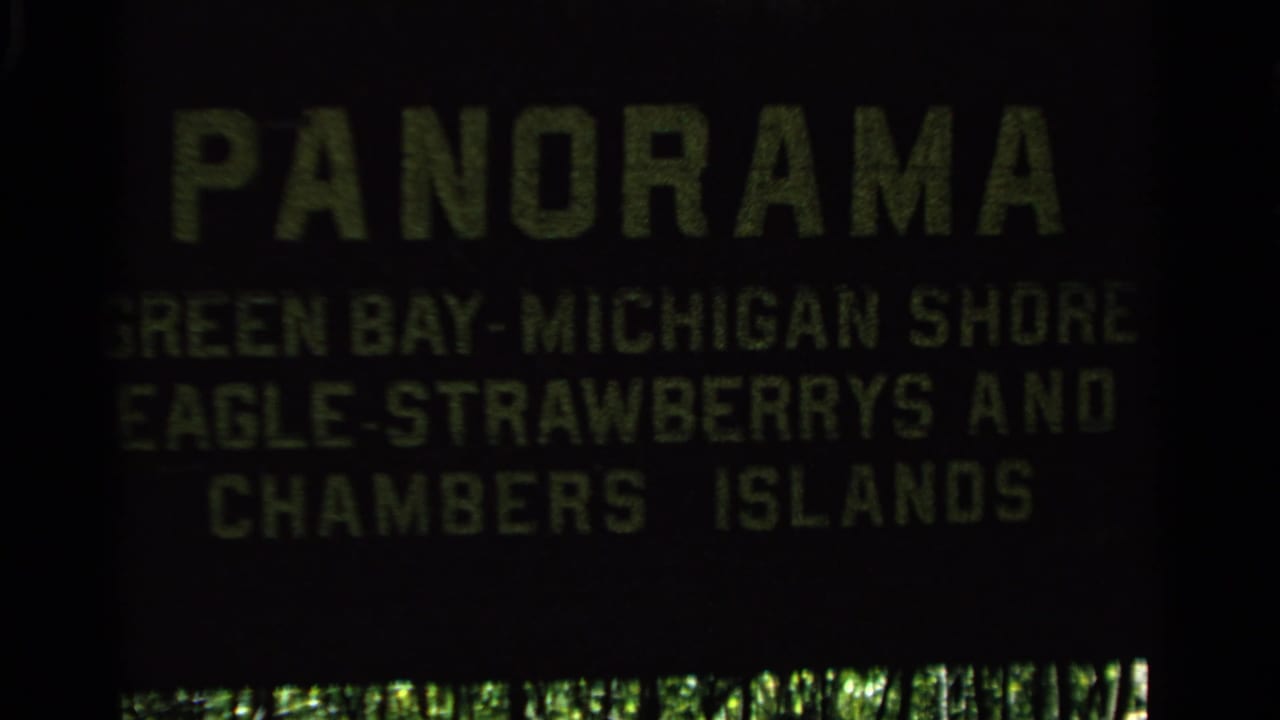 Dark title card with green text reading Panorama and island place names.