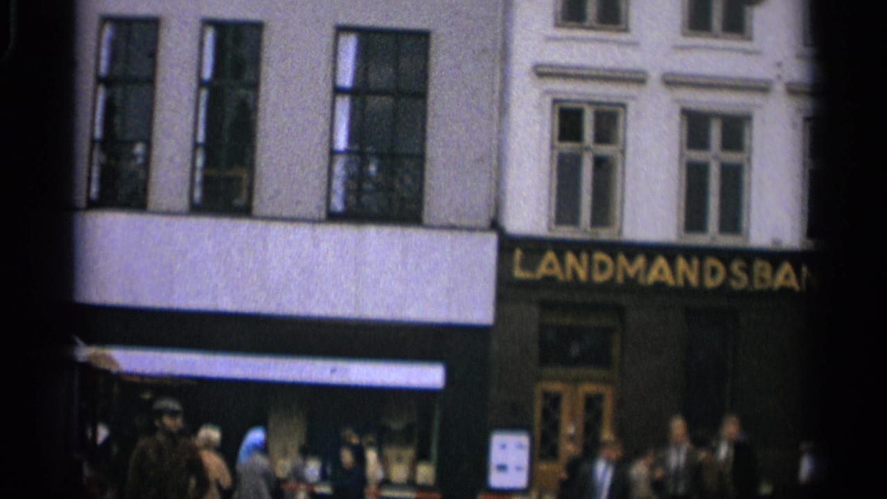 1965 Copenhagen street view of the Landmandsbanken frontage with pedestrians moving below the upper windows.