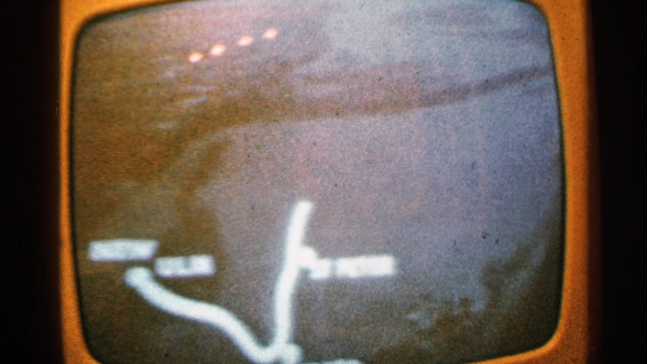 A blurred route map appears on a rounded screen with a white line and labels.