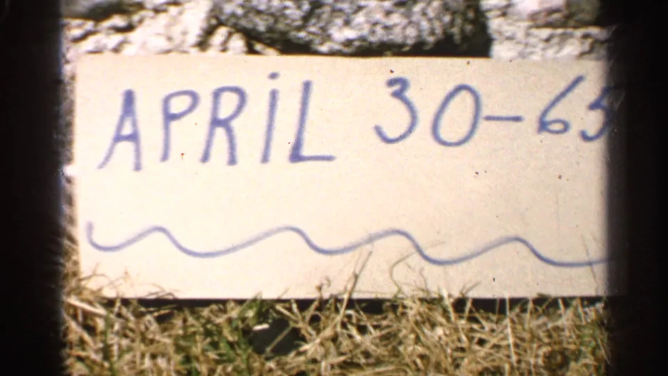 A handwritten date card reading “APRIL 30-65” fills the lower frame, confirming the home-movie date record.