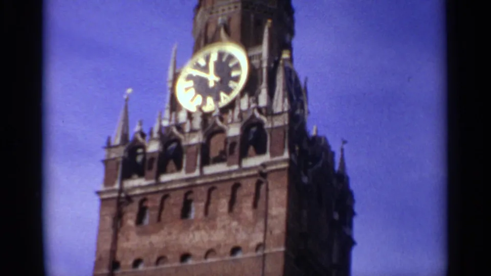 1965 Moscow frame centered on the Spasskaya Tower clock face and brick tower details.